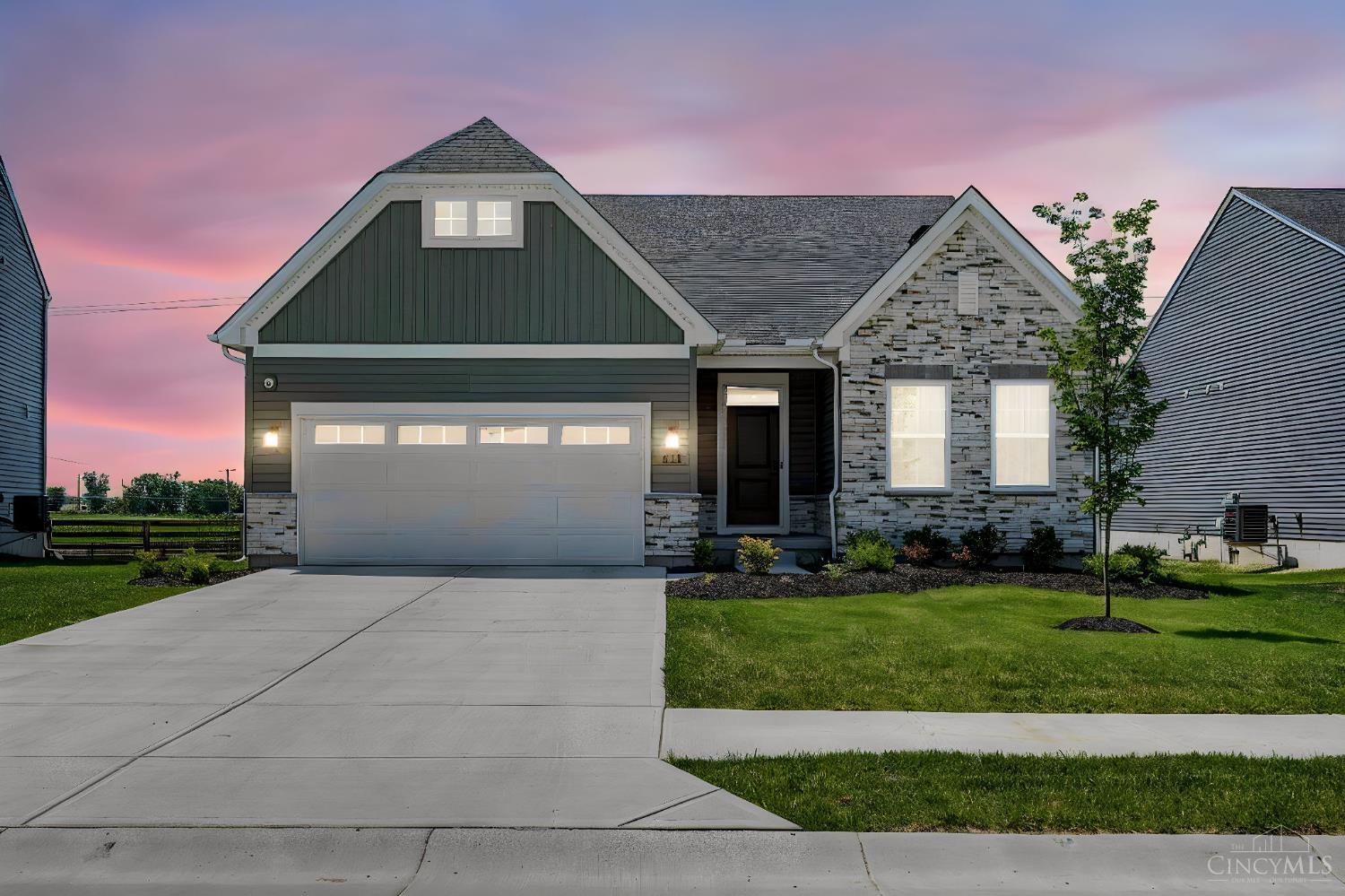 2025 built luxury home at 454 Red Maple Ln Wilmington Ohio listed by Rene Vance of Vance Team Realtors featuring stone fireplace quartz countertops and spa like primary suite